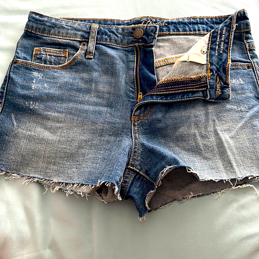 Cut off Jean shorts, stressed denim. Never worn but no tags. 28R,size 6.